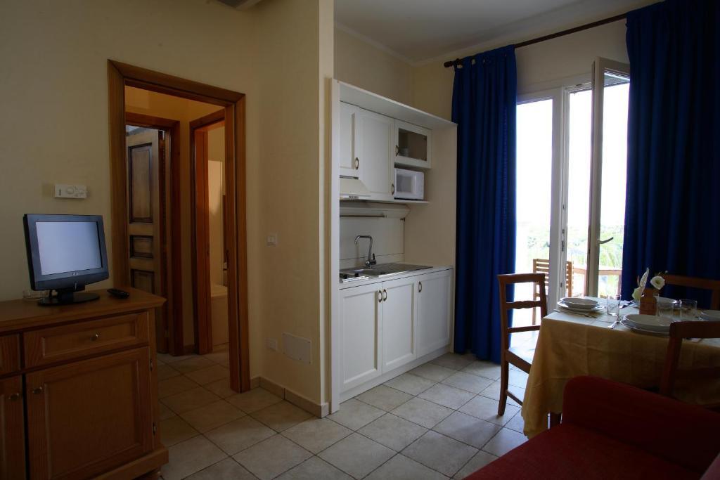 Hotel Resort Portoselvaggio Sant Isidoro  Rum bild